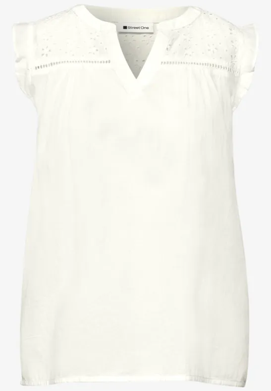 Blousetop met gespleten hals en shiffley-details off white