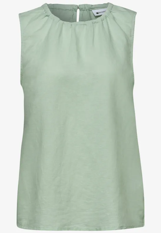 Ärmelloses mintgrünes Top aus Leinen mit rundem Halsausschnitt.