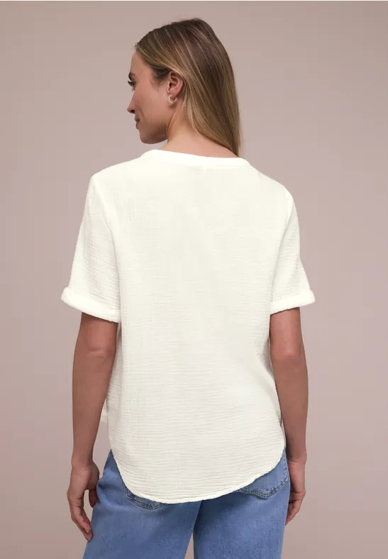 Blouse met korte mouwen in mousseline kwaliteit off white