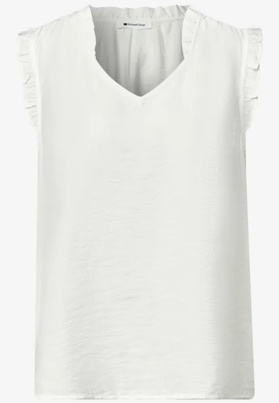 Ärmelloses weißes Damen-Top mit V-Ausschnitt, leichter Textur und verspielten Rüschenärmeln.