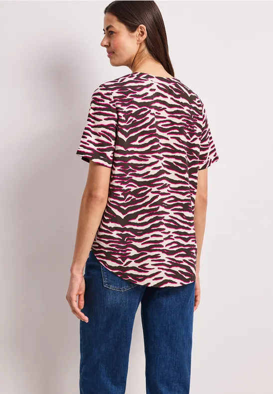 Blouse à manches courtes avec split neck et imprimé minimal rose