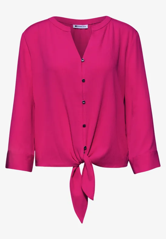 Fuchsia roze blouse met driekwartmouwen en knoopdetail voor