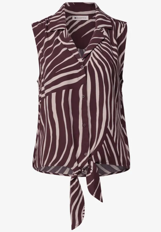 Ärmellose Bluse mit braun-weißem Zebramuster und vorderem Knoten