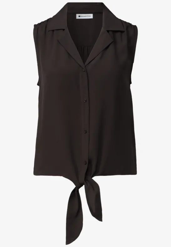 Ärmellose schwarze Bluse mit Hemdkragen, Knopfleiste und vorderem Knotendetail.