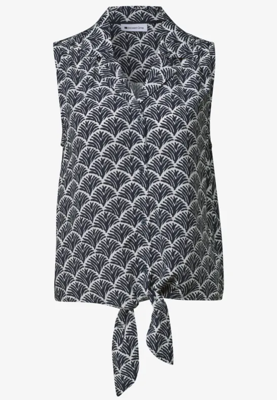 Ärmellose marineblaue Bluse mit Kragen, weißem Muschelmuster und vorn gebundener Schleife.