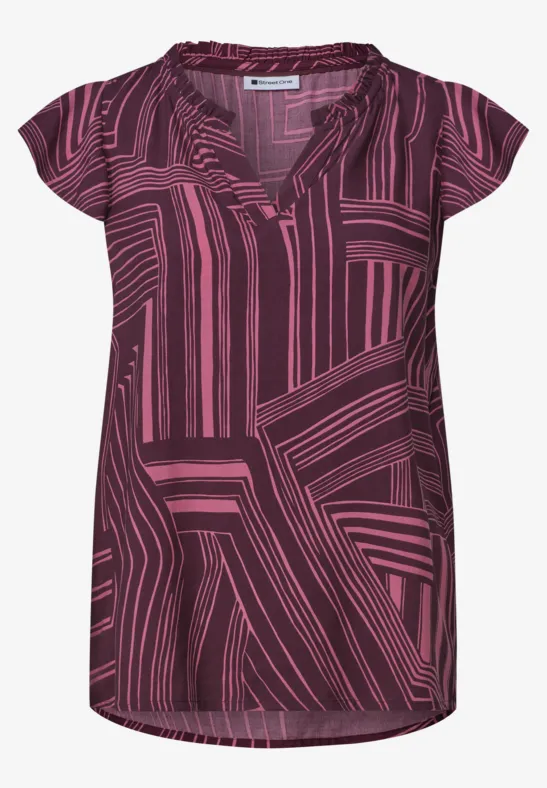 Damesblouse met korte mouwen en roze geometrisch lijnpatroon op donkerpaarse achtergrond