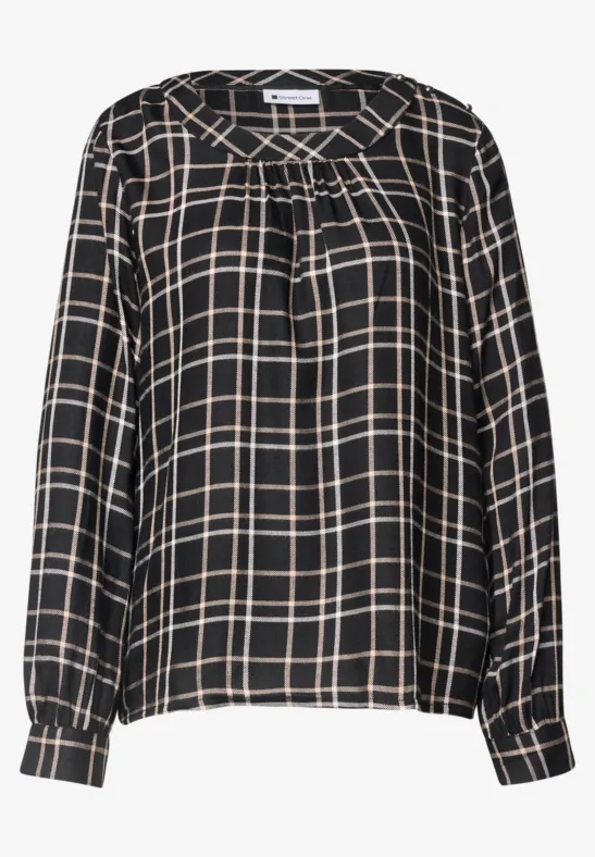 Schwarze Bluse mit beigen Karos, langärmlig mit Falten am Ausschnitt und Manschetten.