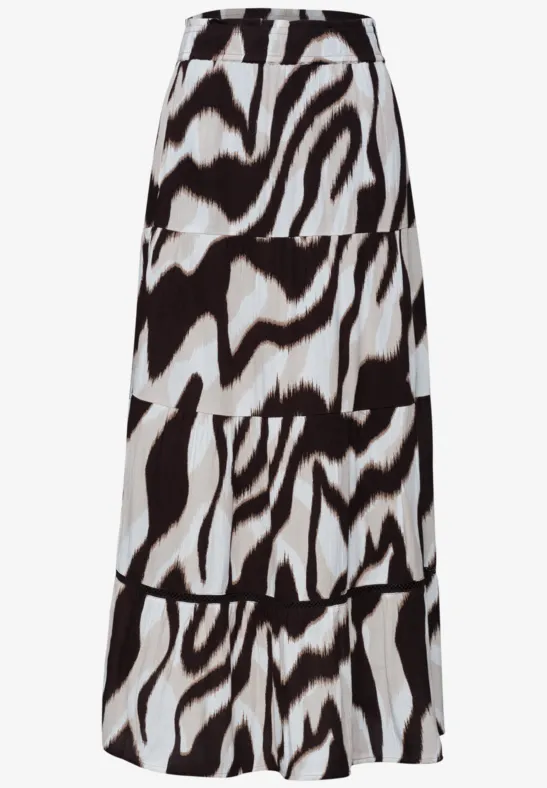 Langer Rock mit Schwarz-Weiß-Tiermuster, hoher Bund und fließendem Schnitt