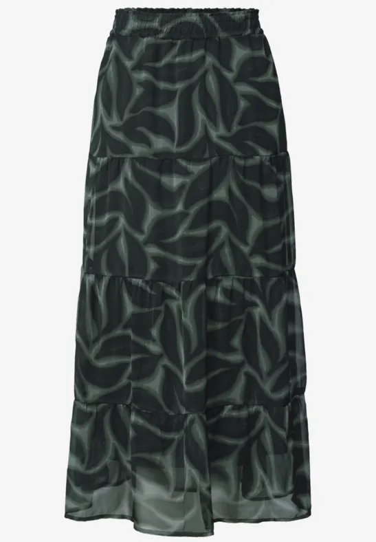 Zwarte maxirok met groen bladerenpatroon, elastische taille.