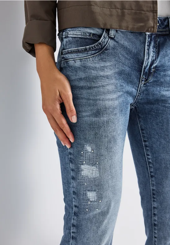 Jeans met destroyed details mid blue authentic wash