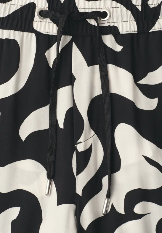 Zwart-wit abstract patroon, elastische taille met aantrekkoord.