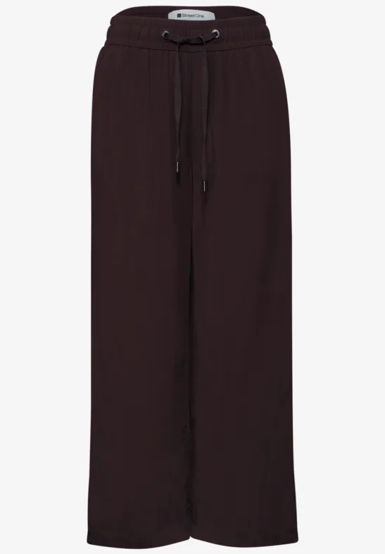Donkerbruine, wijdvallende broek met elastische taille en trekkoorden, nonchalant en lang model.