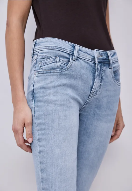 Jeansy z wąską nogawką o kroju Slim Fit i długości Mid Waist light blue random wash