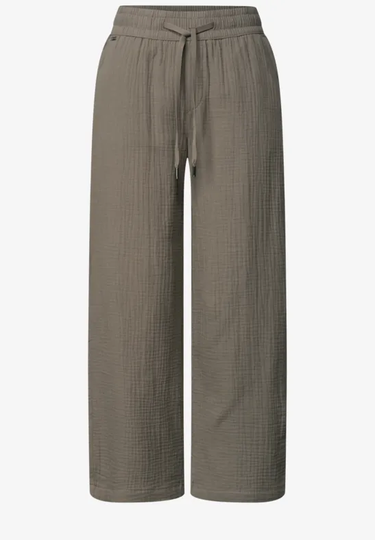 Lockere, weite Hose aus strukturiertem Stoff mit Tunnelzugbund in dezentem Grauton.