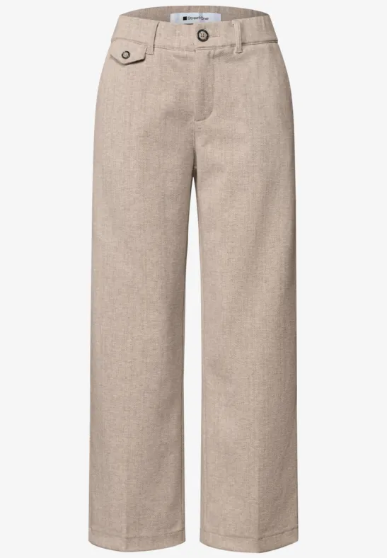 Licht beige linnen broek met wijd uitlopende pijpen, knoopsluiting en zijzakken.