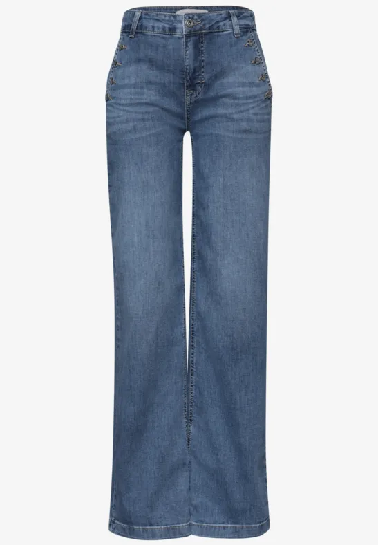 Jean bleu coupe large à taille haute.