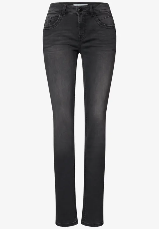 Schwarze Slim-Fit-Damenjeans mit mittlerer Taille, fünf Taschen und leichtem Used-Look.