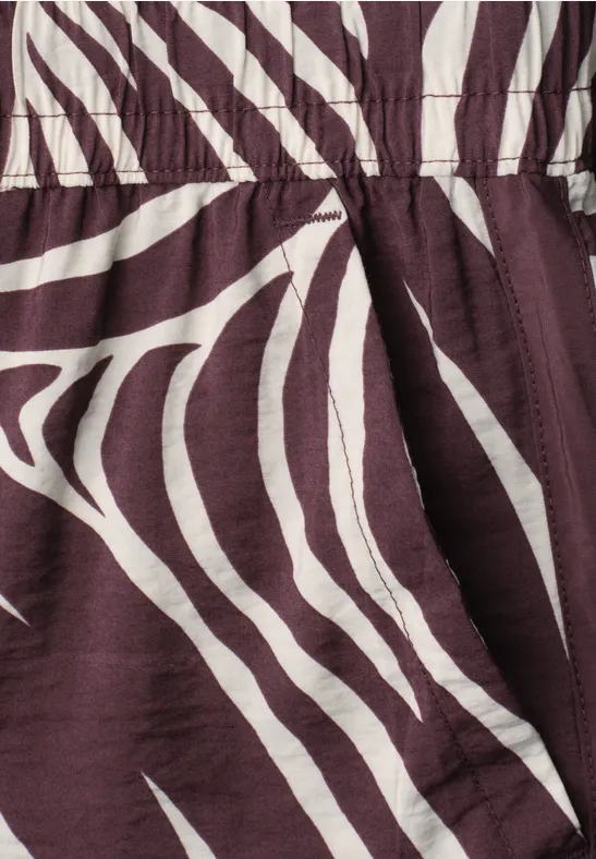 Close-up van bruin-witte stof met zebrapatroon.