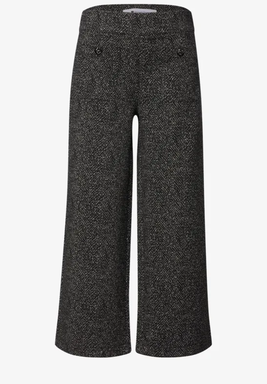 Schwarze, glitzernde, weit geschnittene Damenhose mit hohem Bund und weitem Bein.