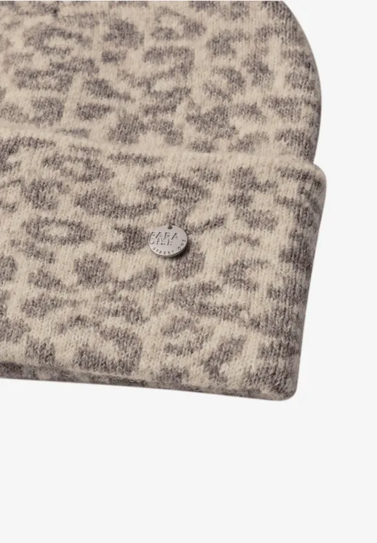 Bonnet jacquard à motif léopard barley beige mel.
