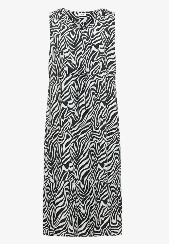 Ärmelloses, bodenlanges Kleid mit schwarz-weißem Zebra-Muster.