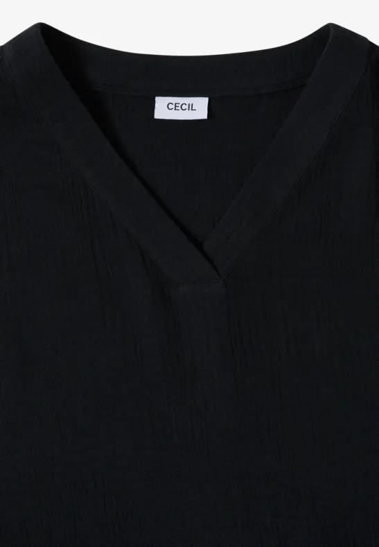 T-shirt noir CECIL à col V avec subtil motif côtelé.