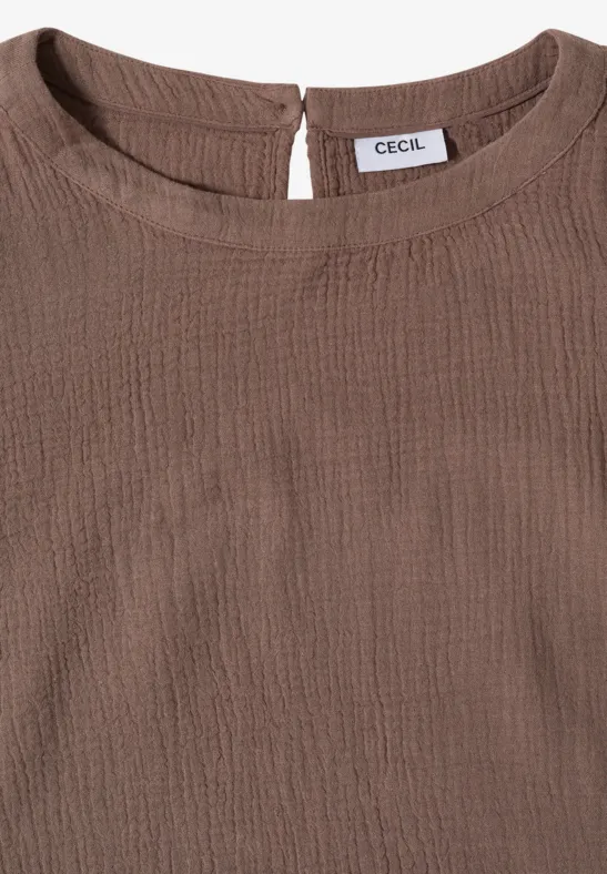 Braunes Textshirt mit Rundhalsausschnitt und CECIL-Logo innen.