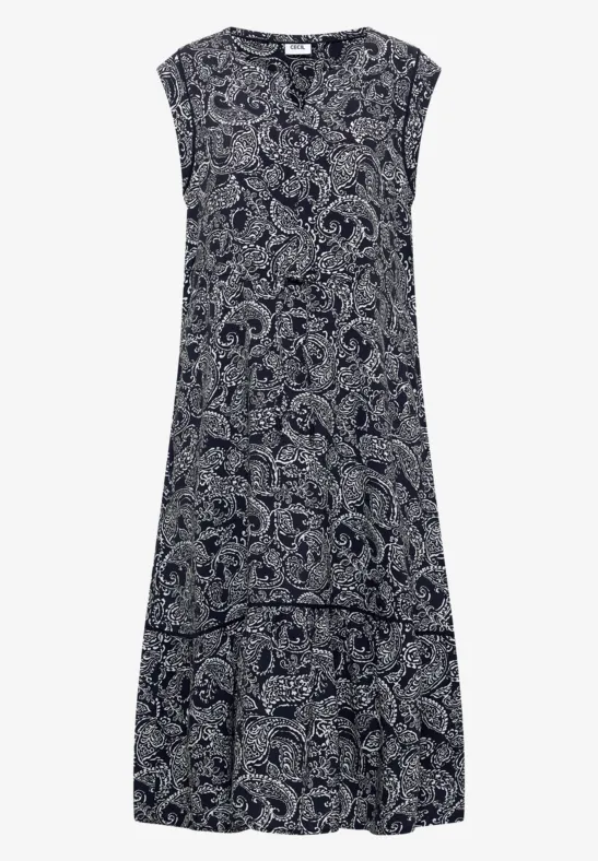 Robe longue sans manches bleu foncé à imprimé cachemire blanc.