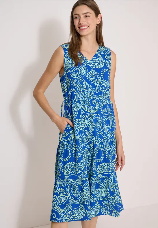 Robe femme bleu à motifs paisley verts, sans manches, encolure en V, longueur genou.
