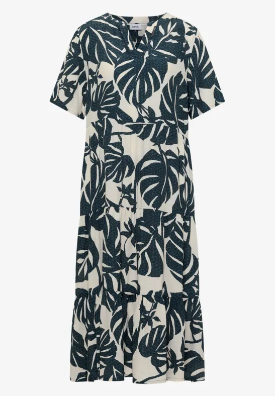 Lockeres Midi-Hemdblusenkleid mit kurzen Ärmeln und blauem Blätter-Print auf cremefarbenem Stoff.