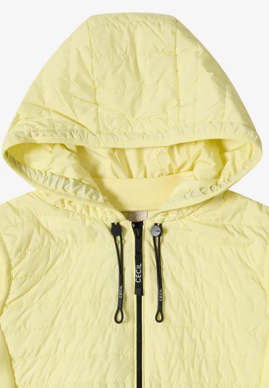 Veste avec un mélange de structures et une capuche iced yellow