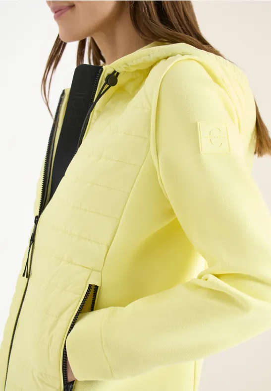 Veste avec un mélange de structures et une capuche iced yellow