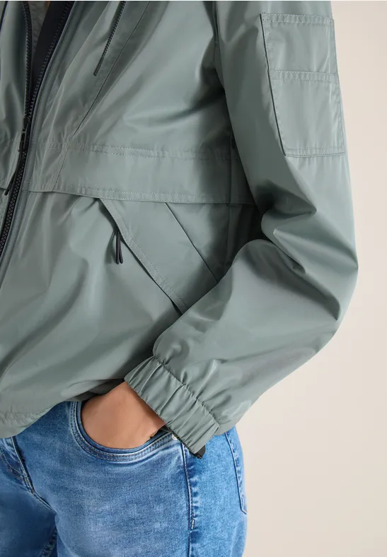 Jacke mit verstaubarer Kapuze kelp green