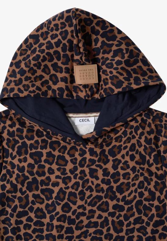 Sweat à capuche plié avec motif léopard marron et capuche intérieure bleu marine.