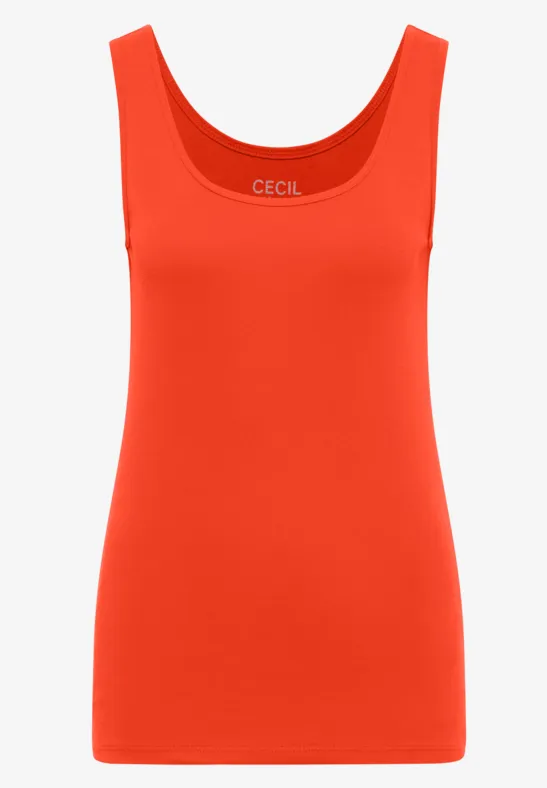 Ein schlichtes, ärmelloses Top in leuchtendem Orange.
