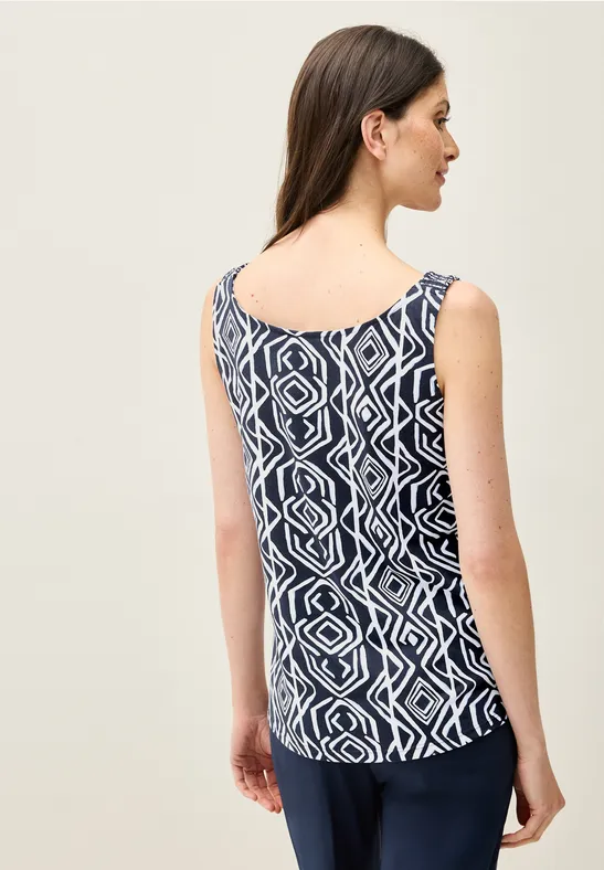 Top avec détails smocks universal blue
