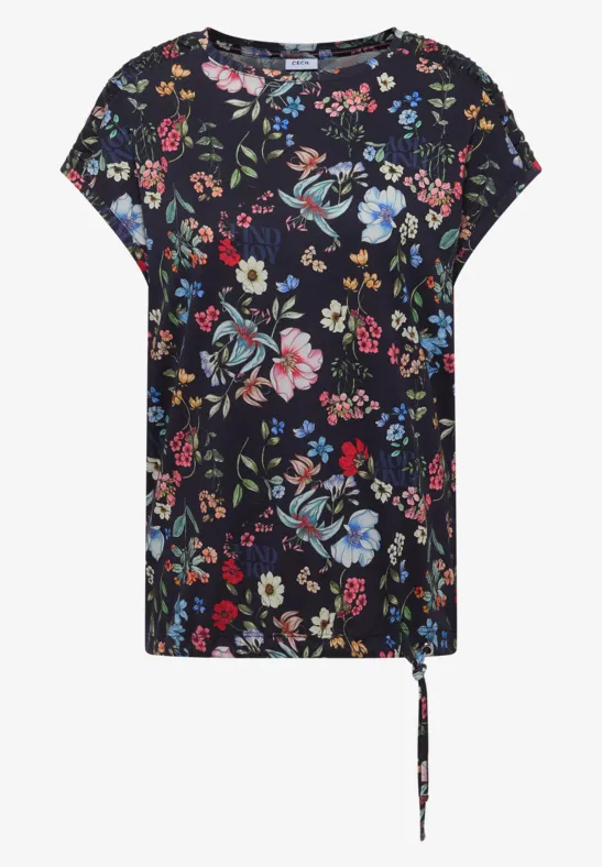 Schwarzes kurzärmeliges Shirt mit buntem floralen Muster und lockerem Schnitt.
