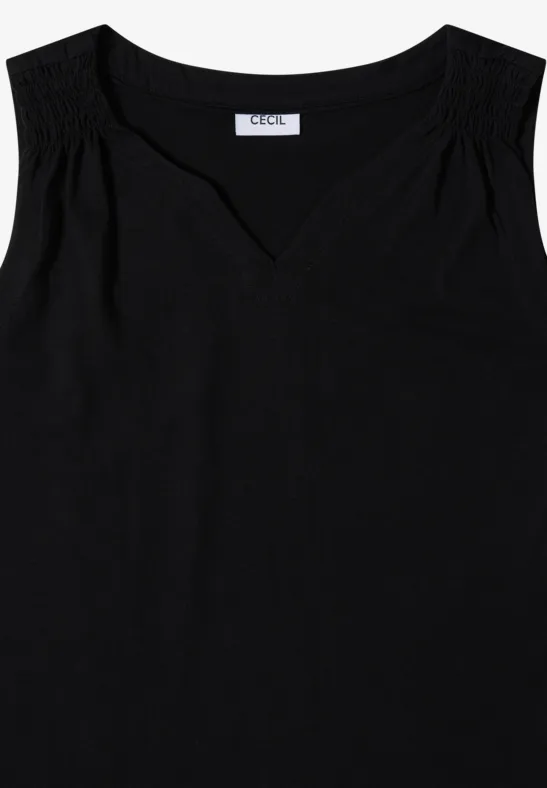 Top noir sans manches pour femme avec encolure en V et fronces délicates aux épaules.