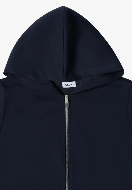 Veste à capuche bleu marine avec fermeture éclair et design épuré.