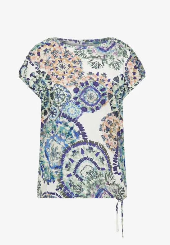Blouse blanche à manches courtes avec imprimé mosaïque abstraite et colorée, cordon latéral.