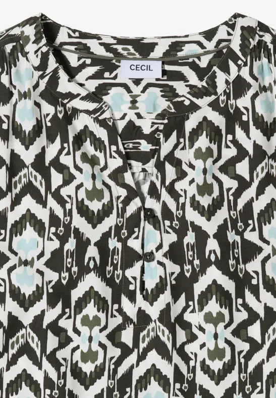 Ärmellose Bluse mit schwarz-weiß-blauem Ethno-Print und V-Ausschnitt.