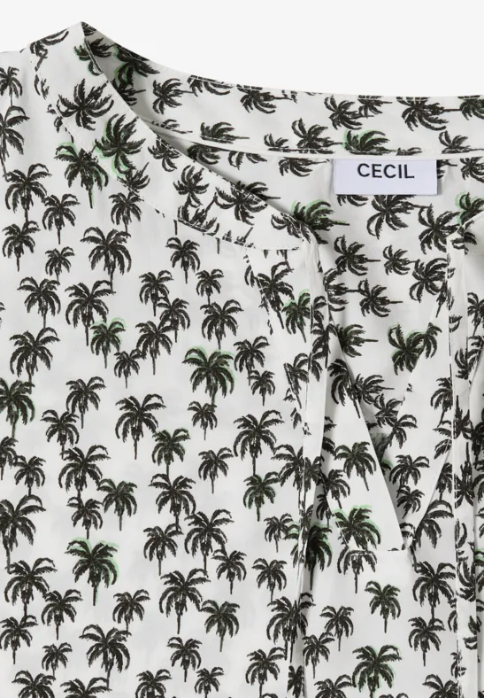 Weiße Bluse mit schwarzem Palmenmuster und grünen Akzenten.