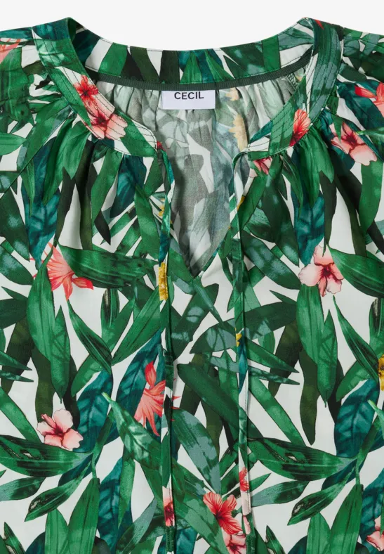 Grüne Bluse mit tropischem Blatt- und Blumenmuster, V-Ausschnitt mit Knopfleiste.