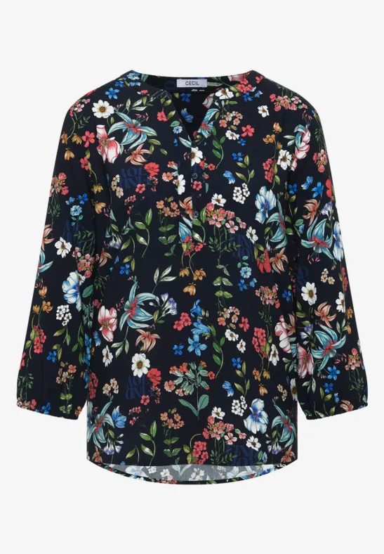 Ein dunkelblauer, locker geschnittener Blusenoberteil mit buntem Blumenmuster