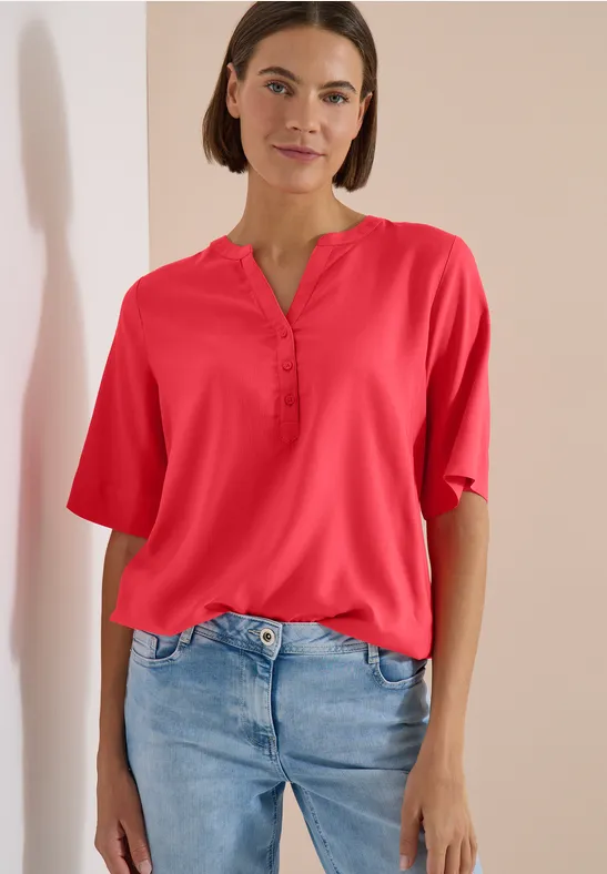 Blouse à manches courtes avec col fendu coral