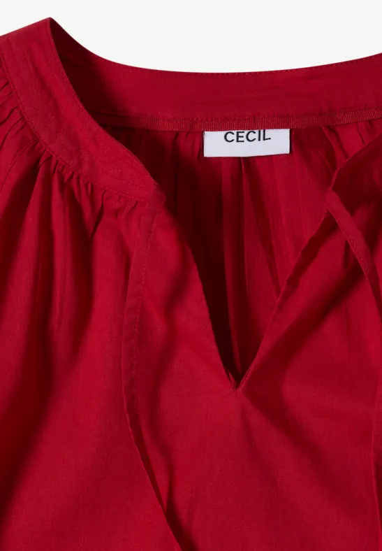 Rote Bluse mit V-Ausschnitt und Kordel, mit 'CECIL' Etikett.