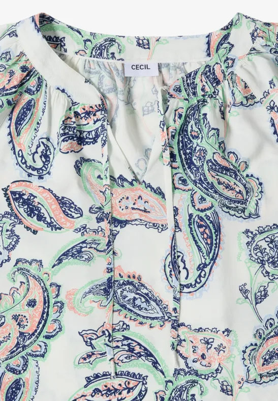 Haut blanc avec motif paisley coloré en bleu et rose