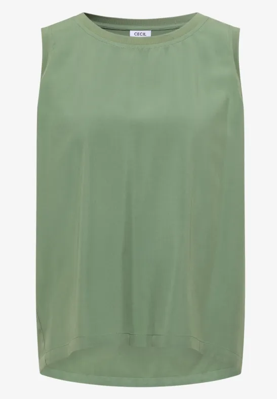 Top sans manches ample couleur vert olive clair avec encolure ronde.
