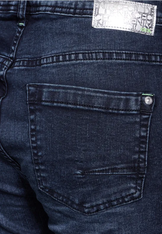 Jeans à la coupe slim blue black used wash