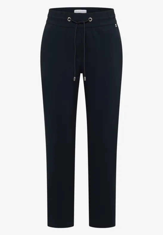 Dunkelblaue, gerade geschnittene Stoffhose mit Tunnelzug und seitlichen Eingrifftaschen.